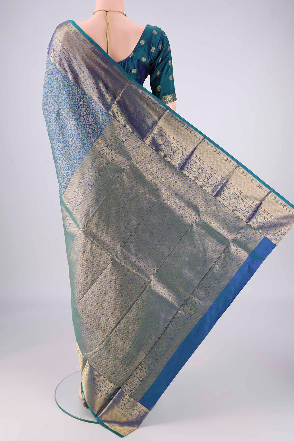 Flat view of Blue Dual Tone Bangalore Silk Saree with Zari Brocade on the body and Zari Border. 