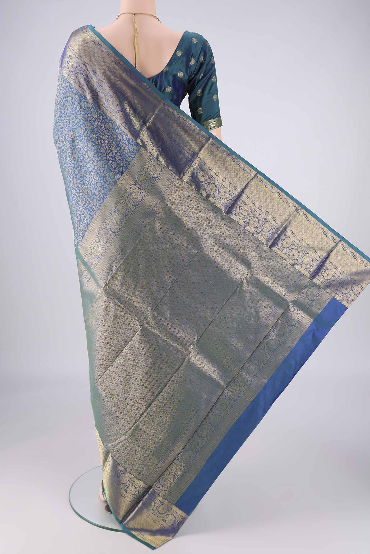 Flat view of Blue Dual Tone Bangalore Silk Saree with Zari Brocade on the body and Zari Border. 
