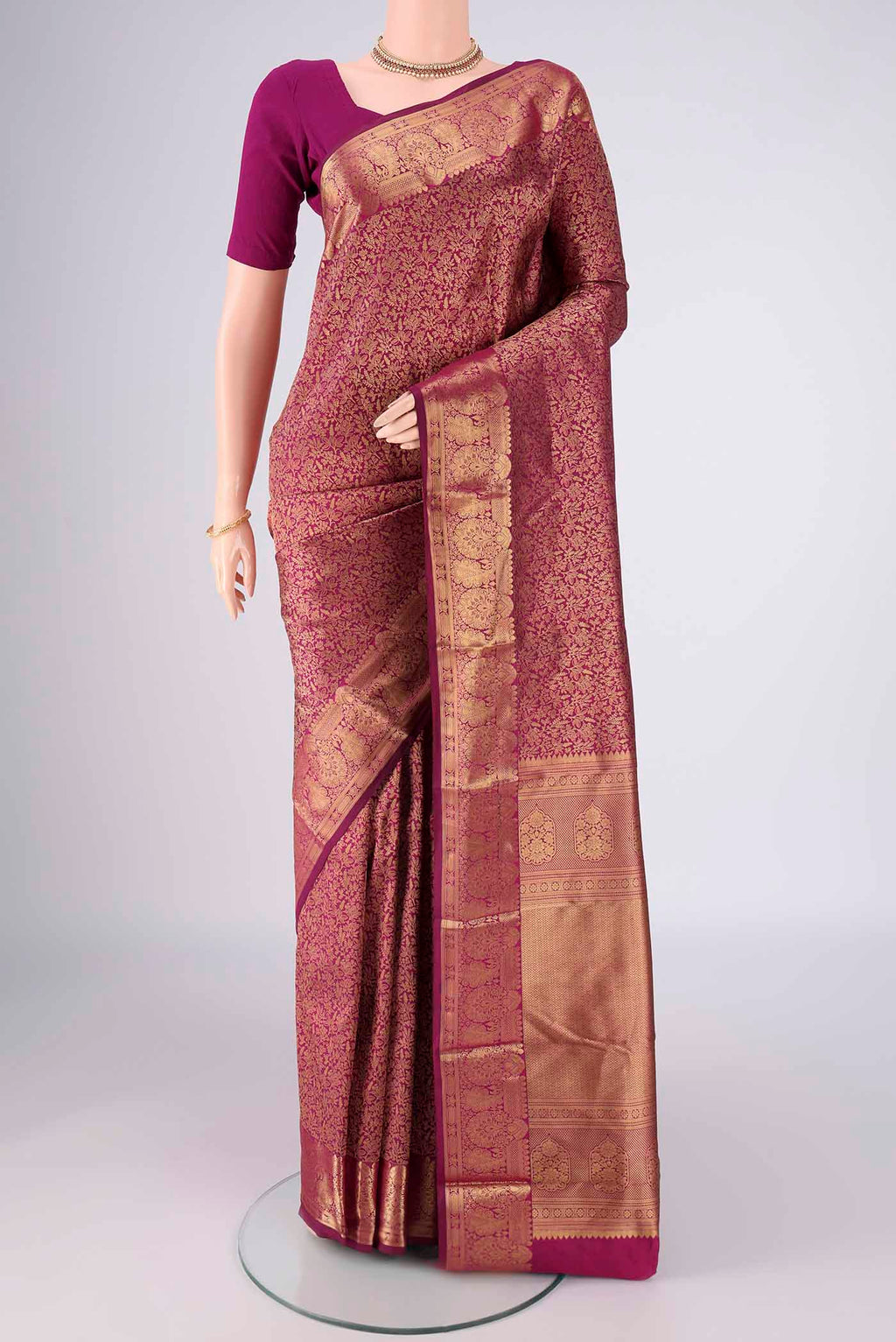 Magenta Bangalore Silk Saree with Zari Brocade on the body and Zari Border.  displayed on a mannequin