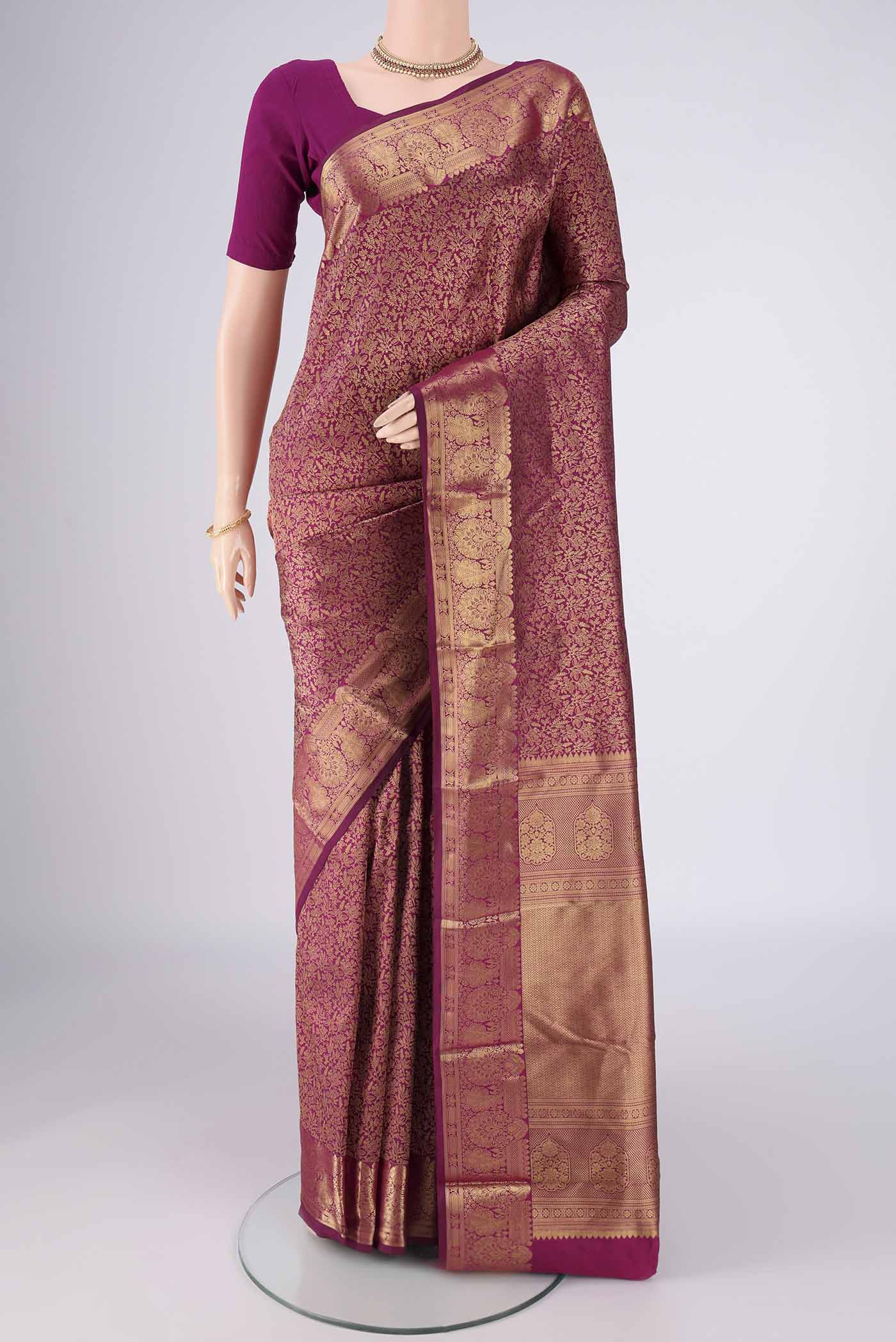 Magenta Bangalore Silk Saree with Zari Brocade on the body and Zari Border.  displayed on a mannequin