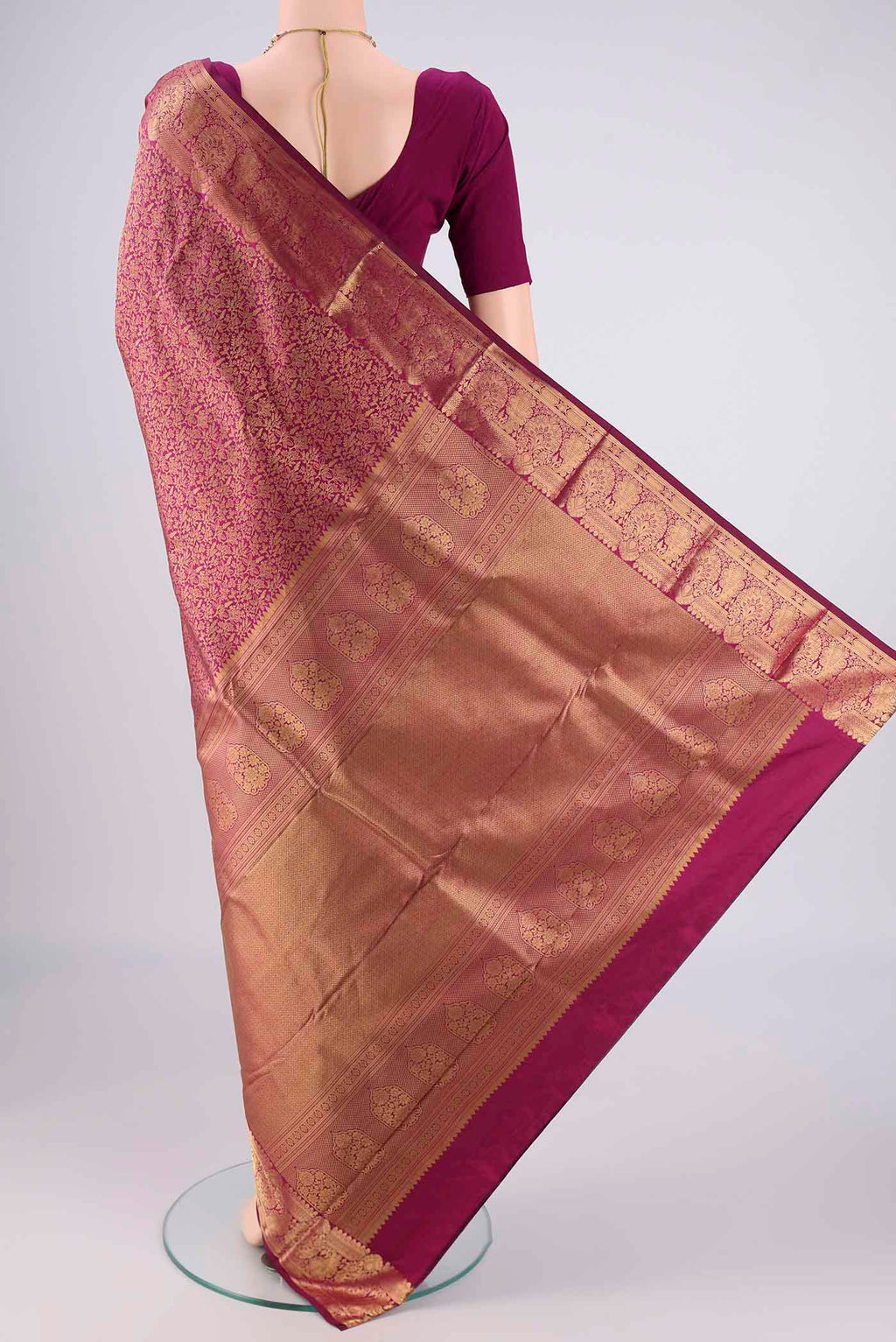 Flat view of Magenta Bangalore Silk Saree with Zari Brocade on the body and Zari Border. 