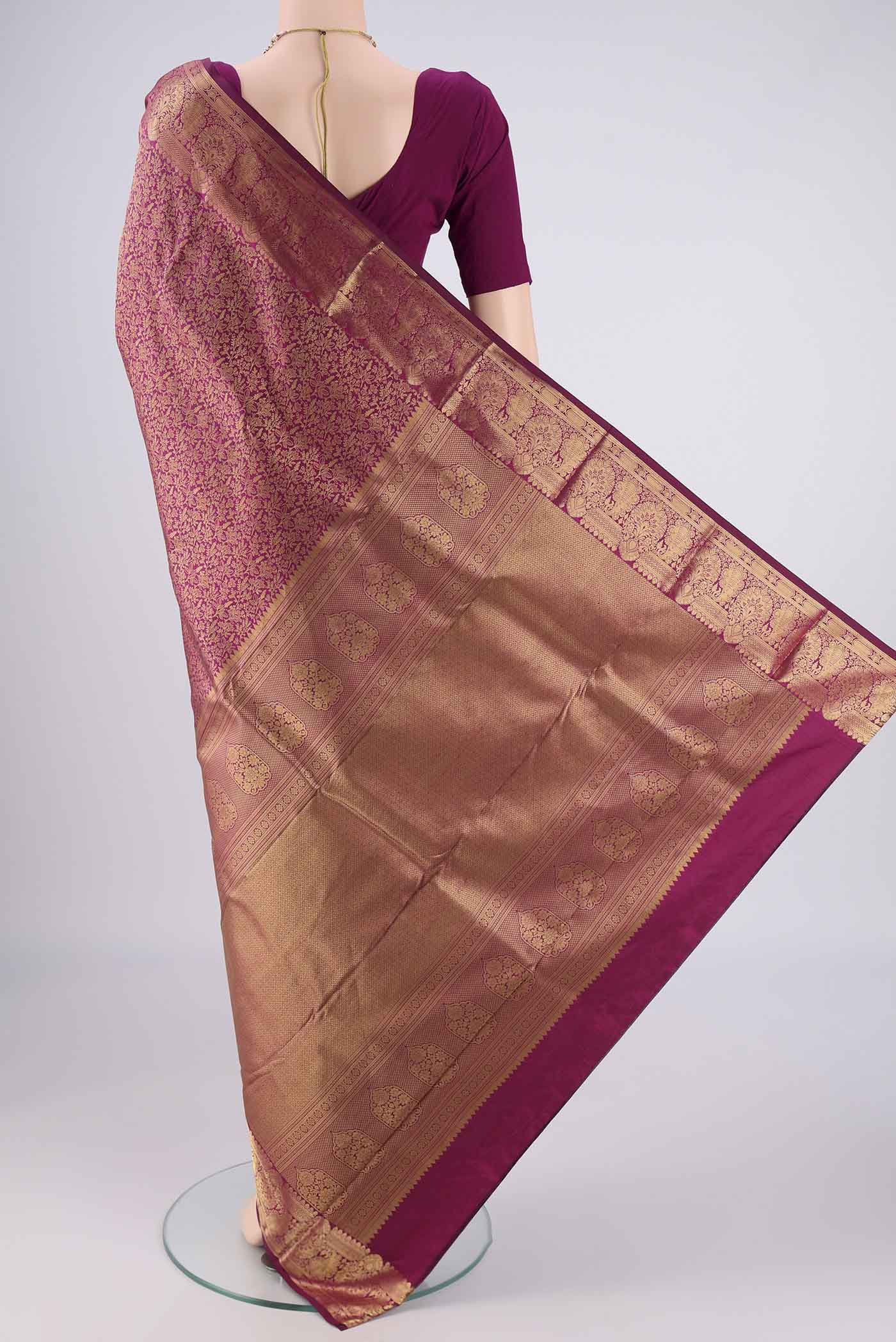 Flat view of Magenta Bangalore Silk Saree with Zari Brocade on the body and Zari Border. 