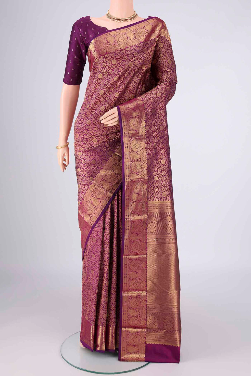 Purple Bangalore Silk Saree with Zari Brocade on the body and Zari Border.  displayed on a mannequin