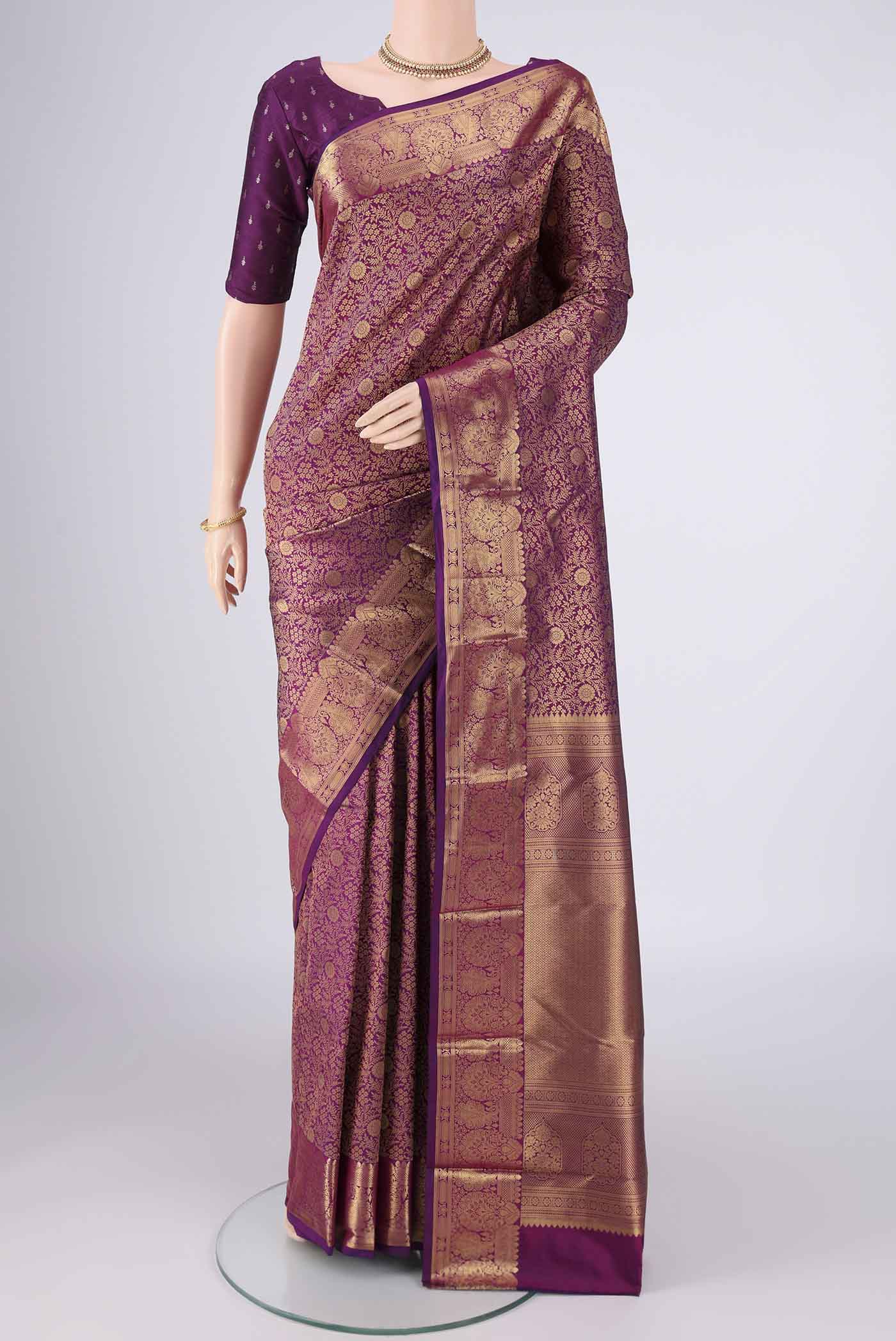 Purple Bangalore Silk Saree with Zari Brocade on the body and Zari Border.  displayed on a mannequin