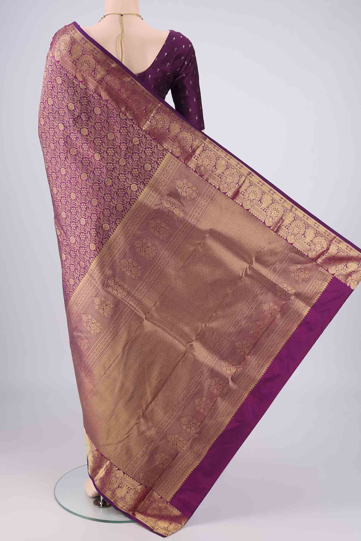 Flat view of Purple Bangalore Silk Saree with Zari Brocade on the body and Zari Border. 
