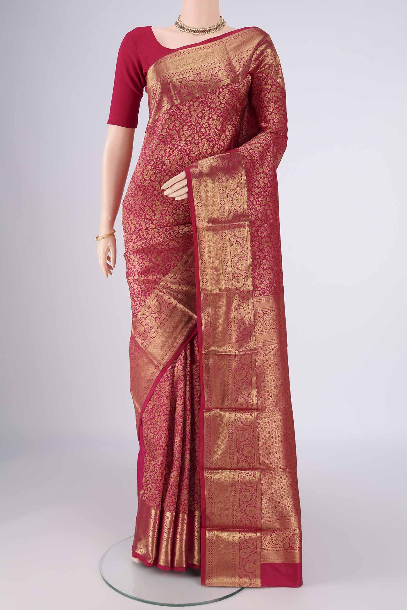 Dark Pink Bangalore Silk Saree with Zari Brocade on the body and Zari Border.  displayed on a mannequin