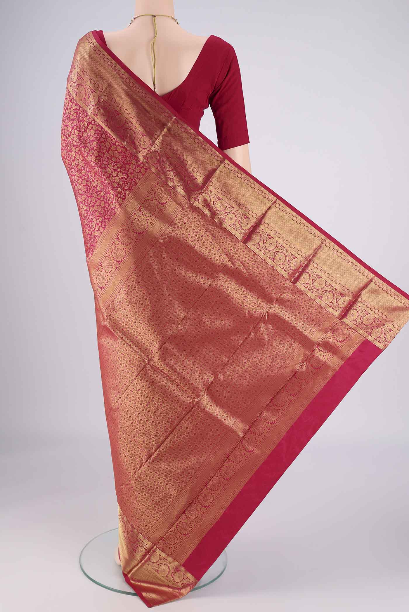 Flat view of Dark Pink Bangalore Silk Saree with Zari Brocade on the body and Zari Border. 