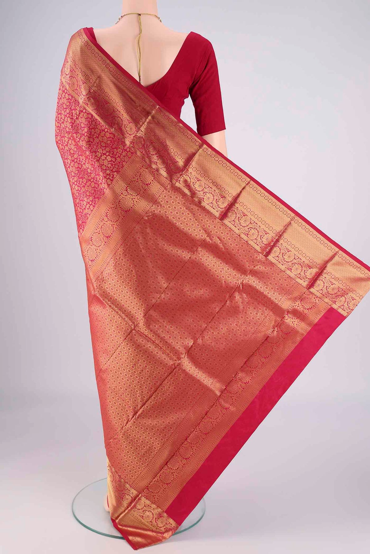 Flat view of Dark Pink Bangalore Silk Saree with Zari Brocade on the body and Zari Border. 