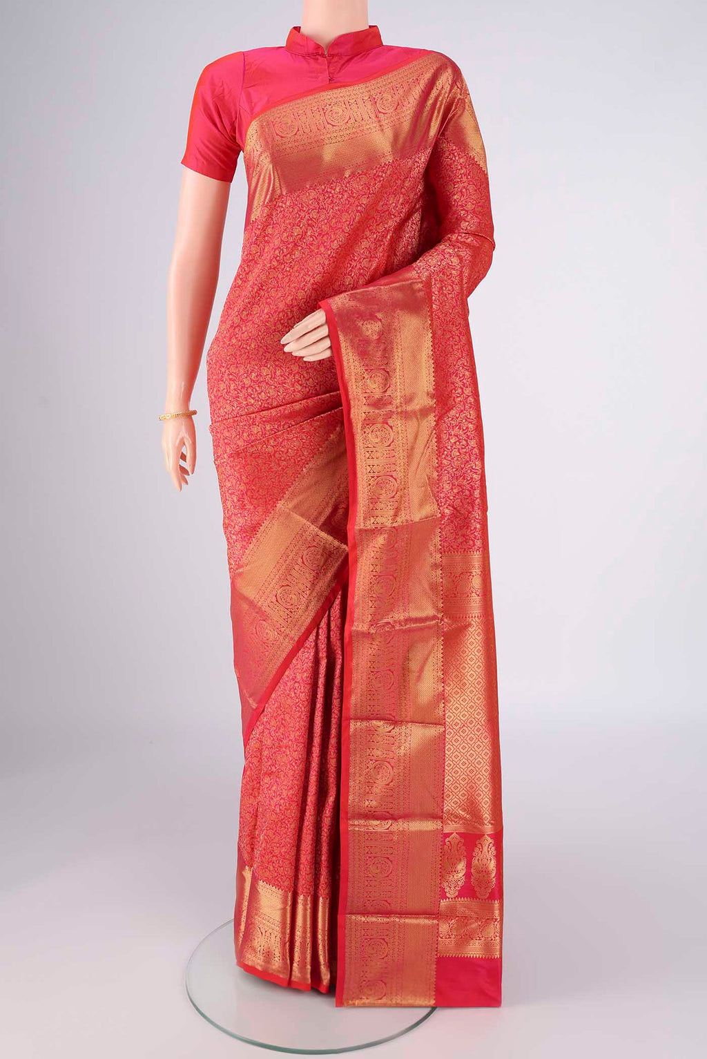 Dark Pink Bangalore Silk Saree with Zari Brocade on the body and Zari Border.  displayed on a mannequin