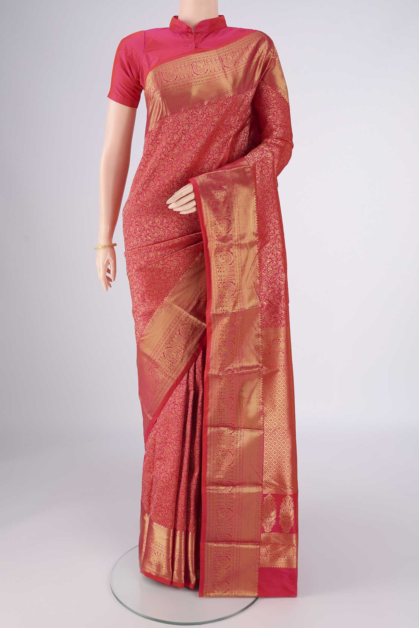 Dark Pink Bangalore Silk Saree with Zari Brocade on the body and Zari Border.  displayed on a mannequin