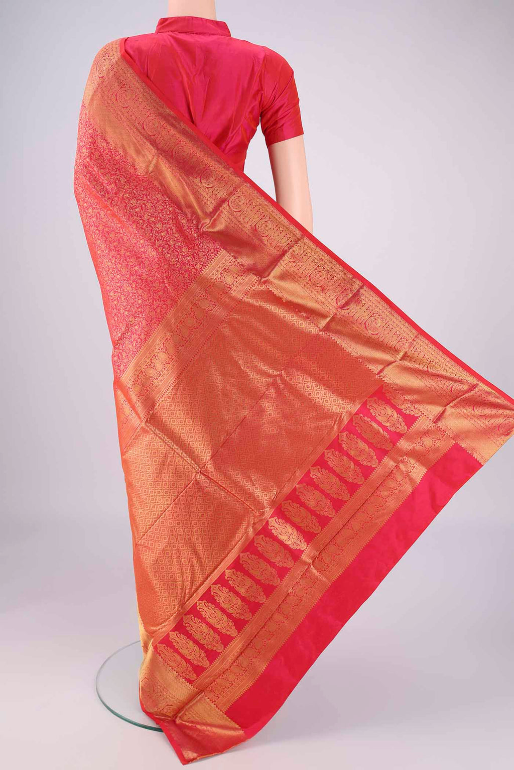 Flat view of Dark Pink Bangalore Silk Saree with Zari Brocade on the body and Zari Border. 