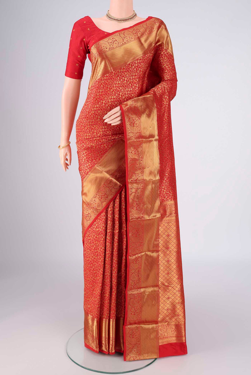 Red Bangalore Silk Saree with Zari Brocade on the body and Zari Border.  displayed on a mannequin