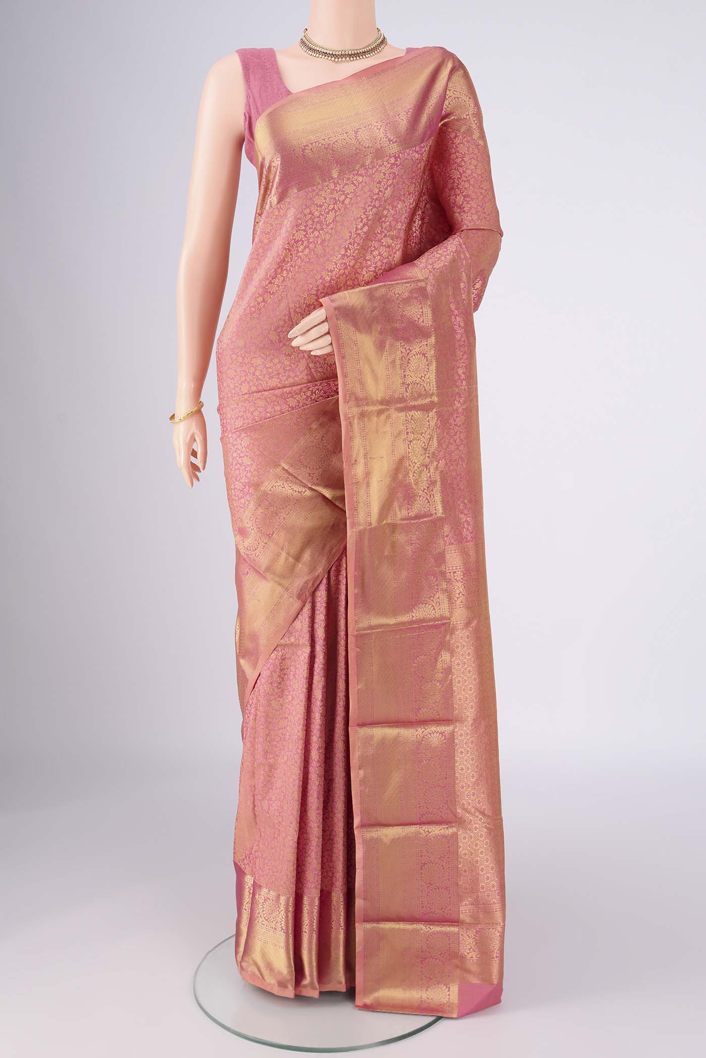 Rose Gold Bangalore Silk Saree with Zari Brocade on the body and Zari Border.  displayed on a mannequin