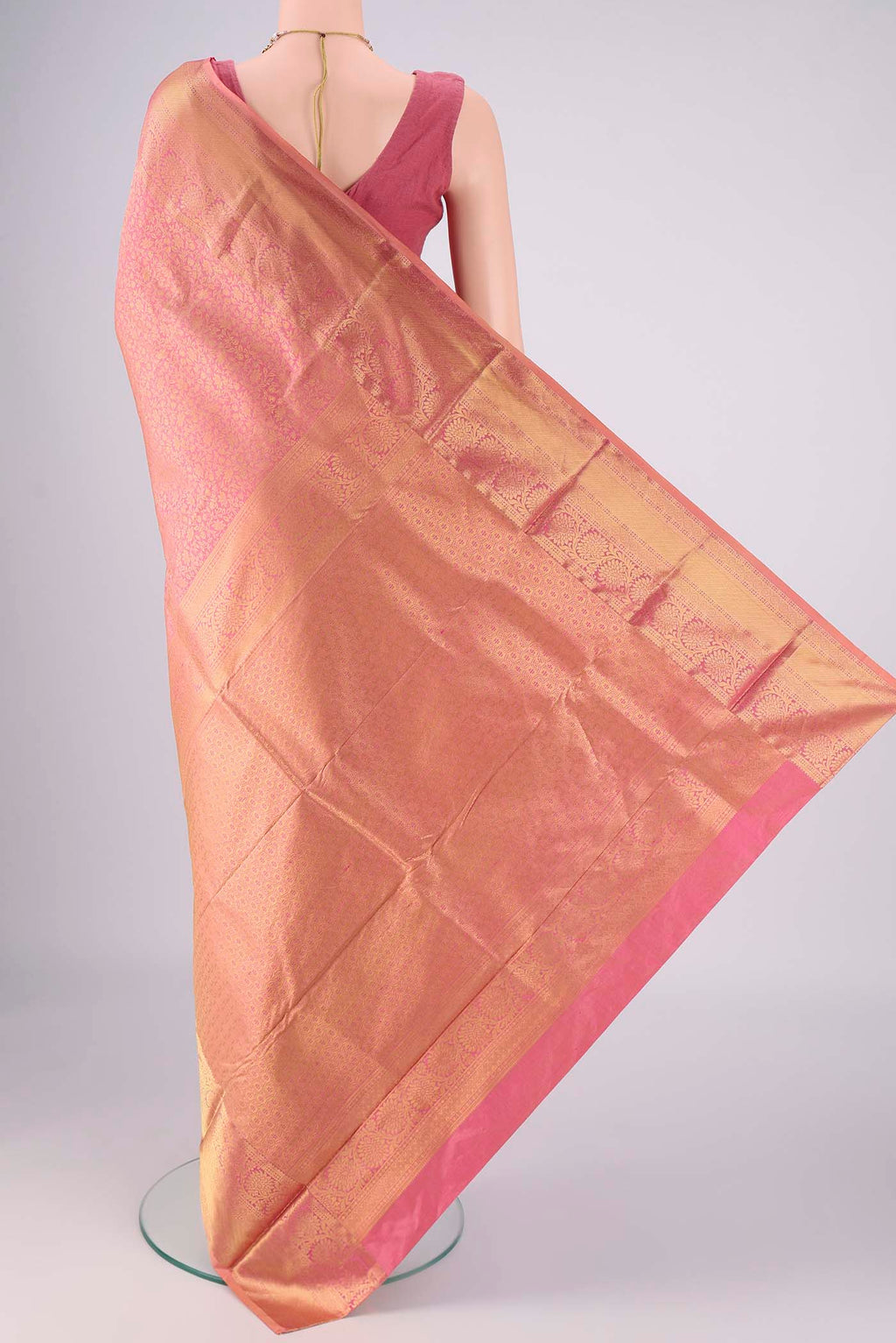 Flat view of Rose Gold Bangalore Silk Saree with Zari Brocade on the body and Zari Border. 