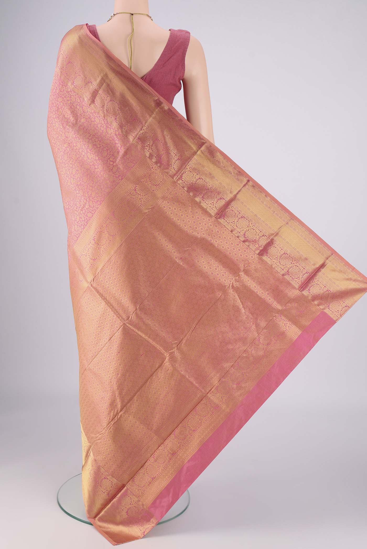 Flat view of Rose Gold Bangalore Silk Saree with Zari Brocade on the body and Zari Border. 