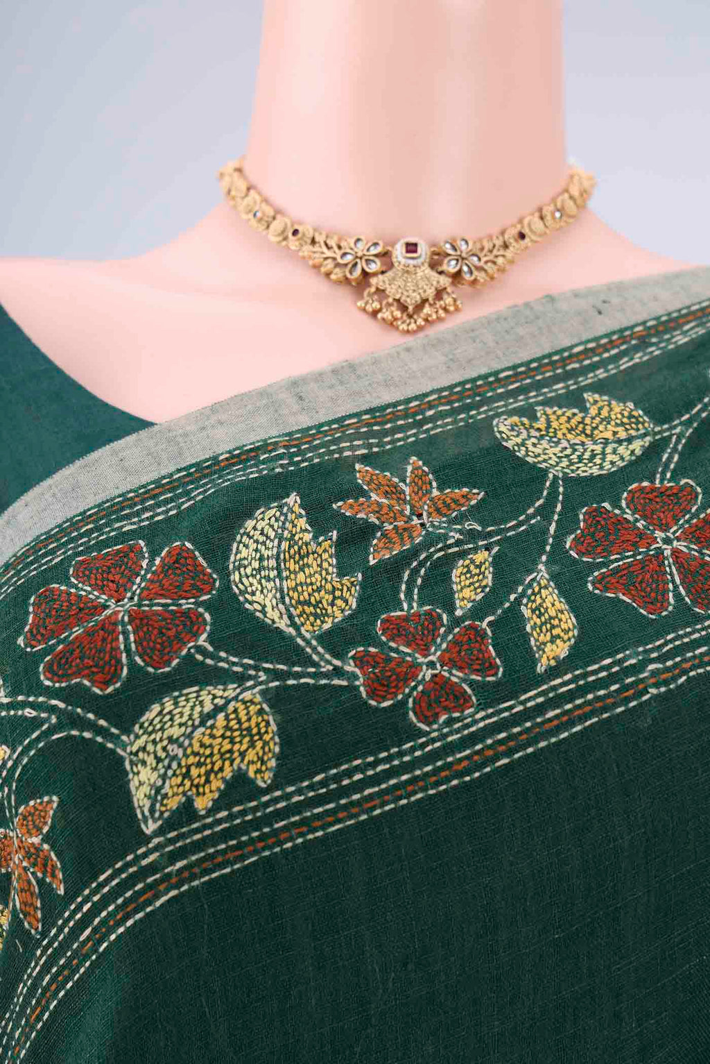 Border image of Bottle Green Linen Cotton Saree with Kantha Work on the body and Thread Border. 