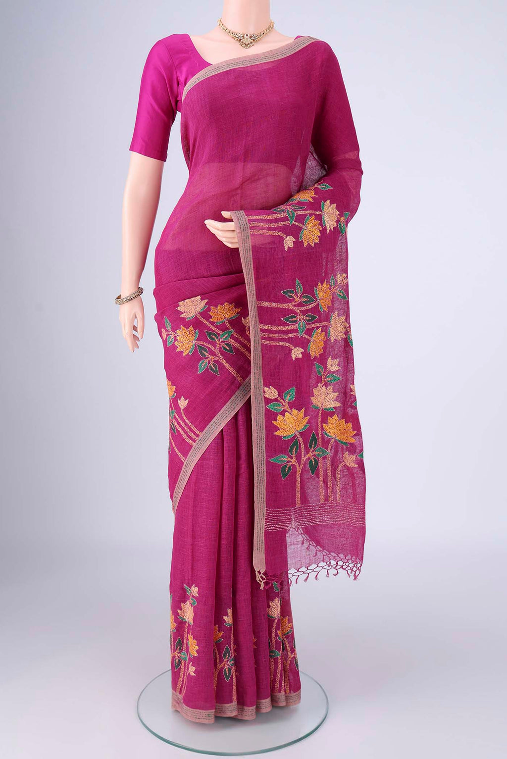Light Magenta Linen Cotton Saree with Kantha Work on the body and Thread Border.  displayed on a mannequin