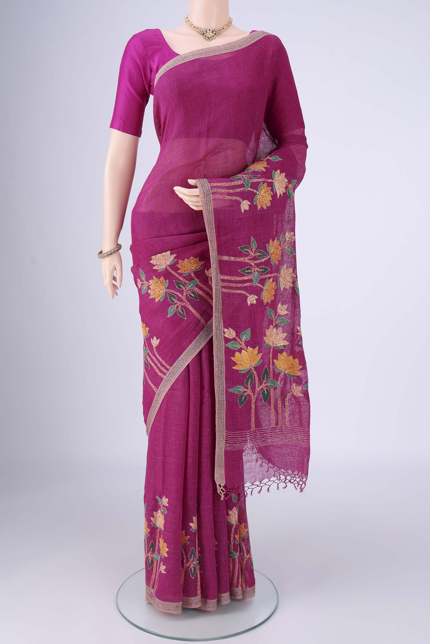 Light Magenta Linen Cotton Saree with Kantha Work on the body and Thread Border.  displayed on a mannequin
