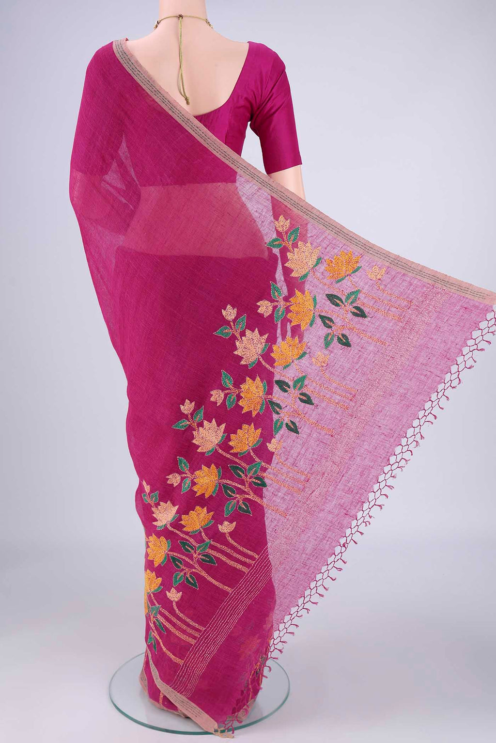 Flat view of Light Magenta Linen Cotton Saree with Kantha Work on the body and Thread Border. 
