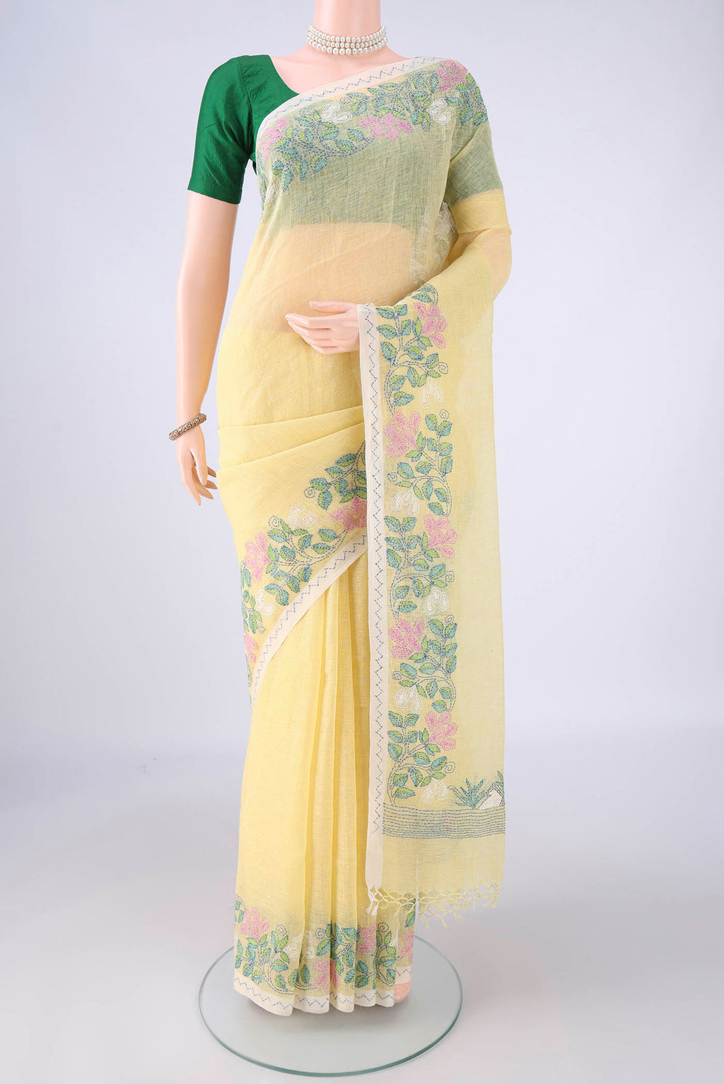 Lemon Yellow Linen Saree with Plain Body and Thread Border.  displayed on a mannequin