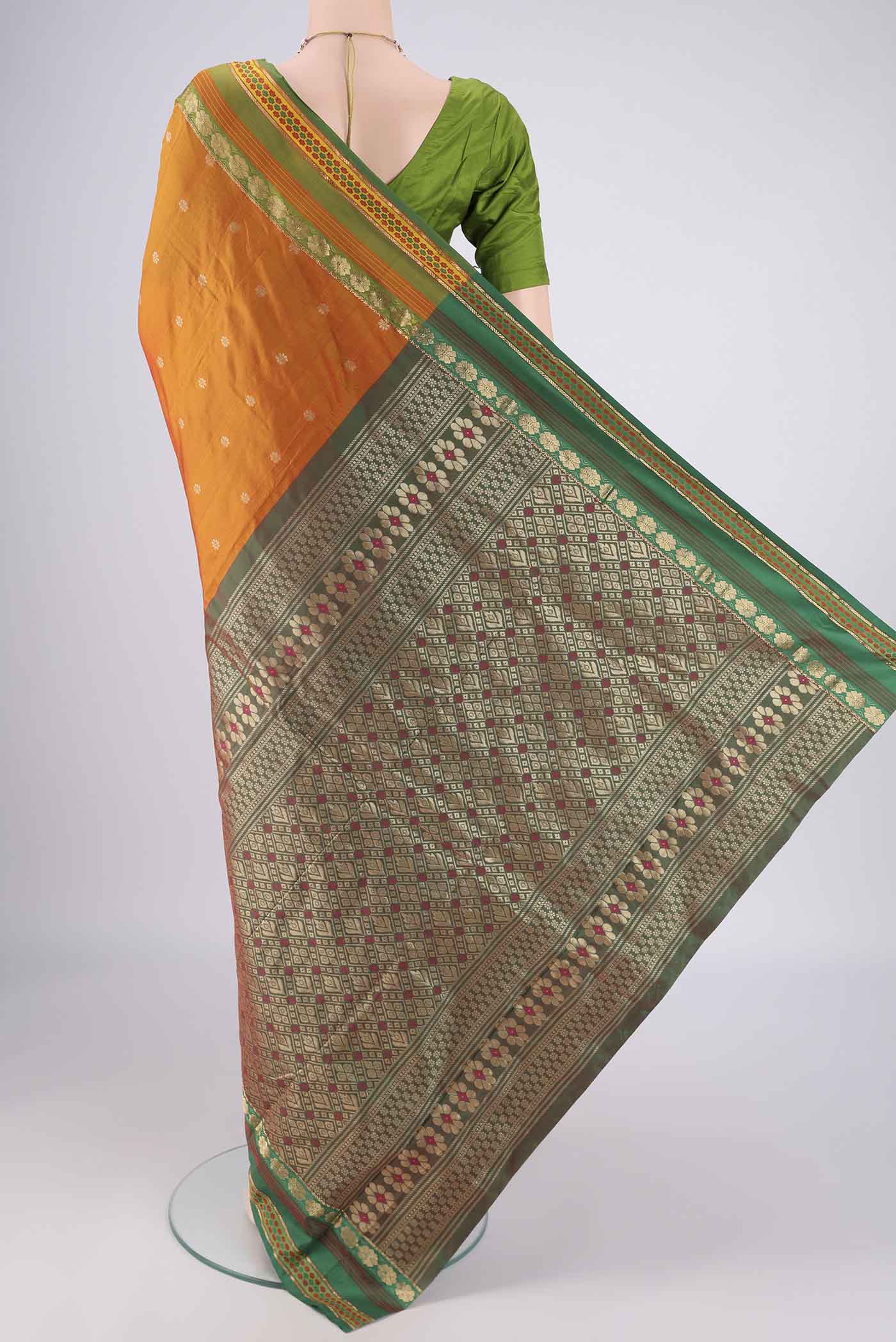 Flat view of Mustard Blended Bangalore Silk Saree with Zari Butta on the body and Zari Border. 