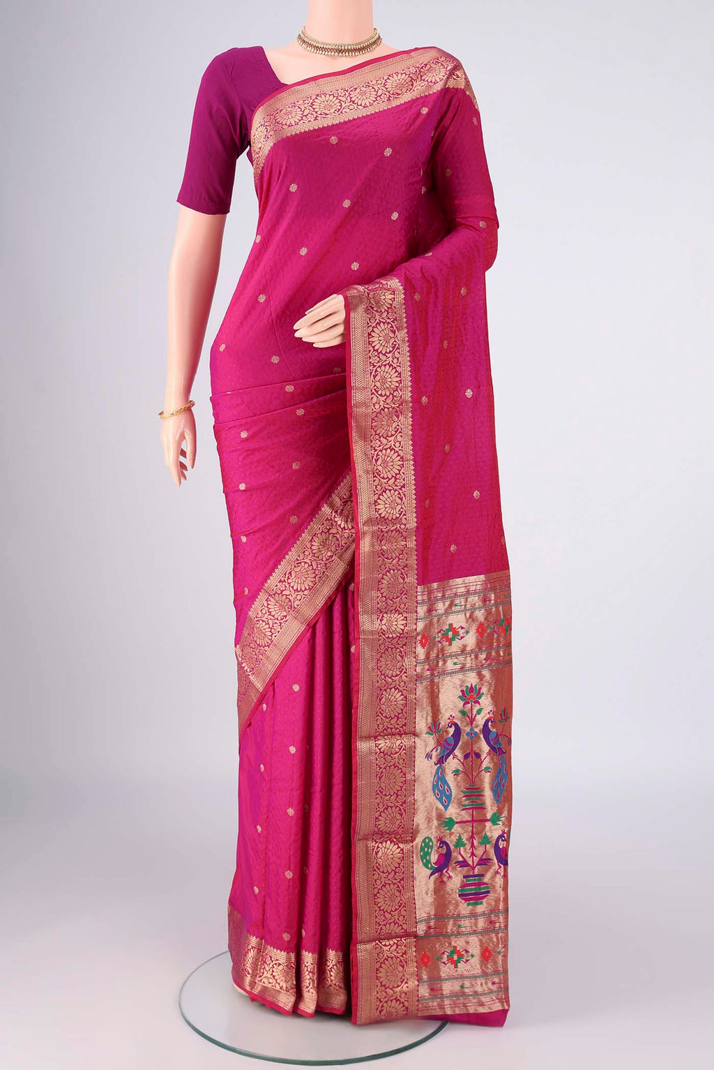 Pink Blended Bangalore Silk Saree with Jacquard design on the body and Zari Border.  displayed on a mannequin