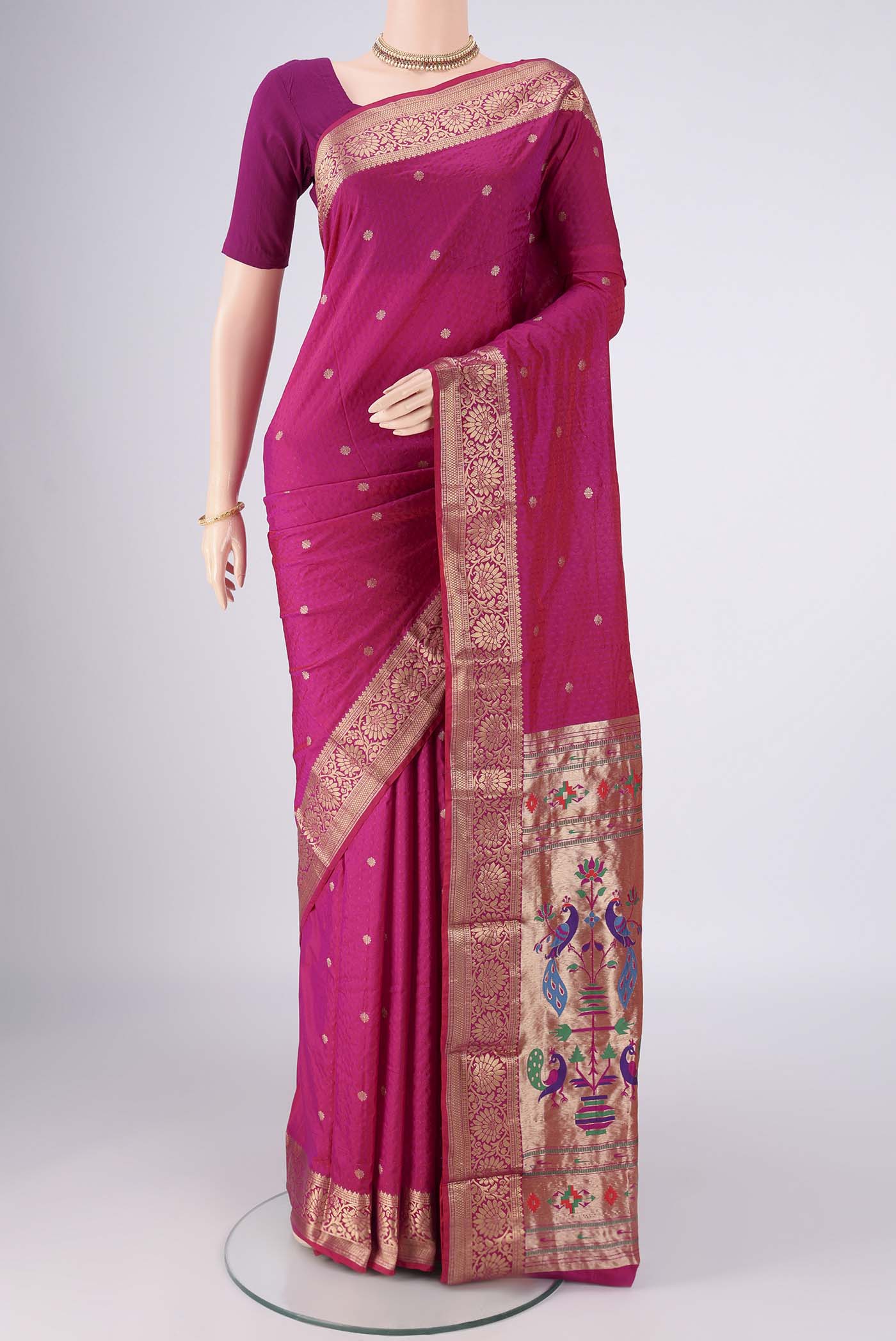 Pink Blended Bangalore Silk Saree with Jacquard design on the body and Zari Border.  displayed on a mannequin