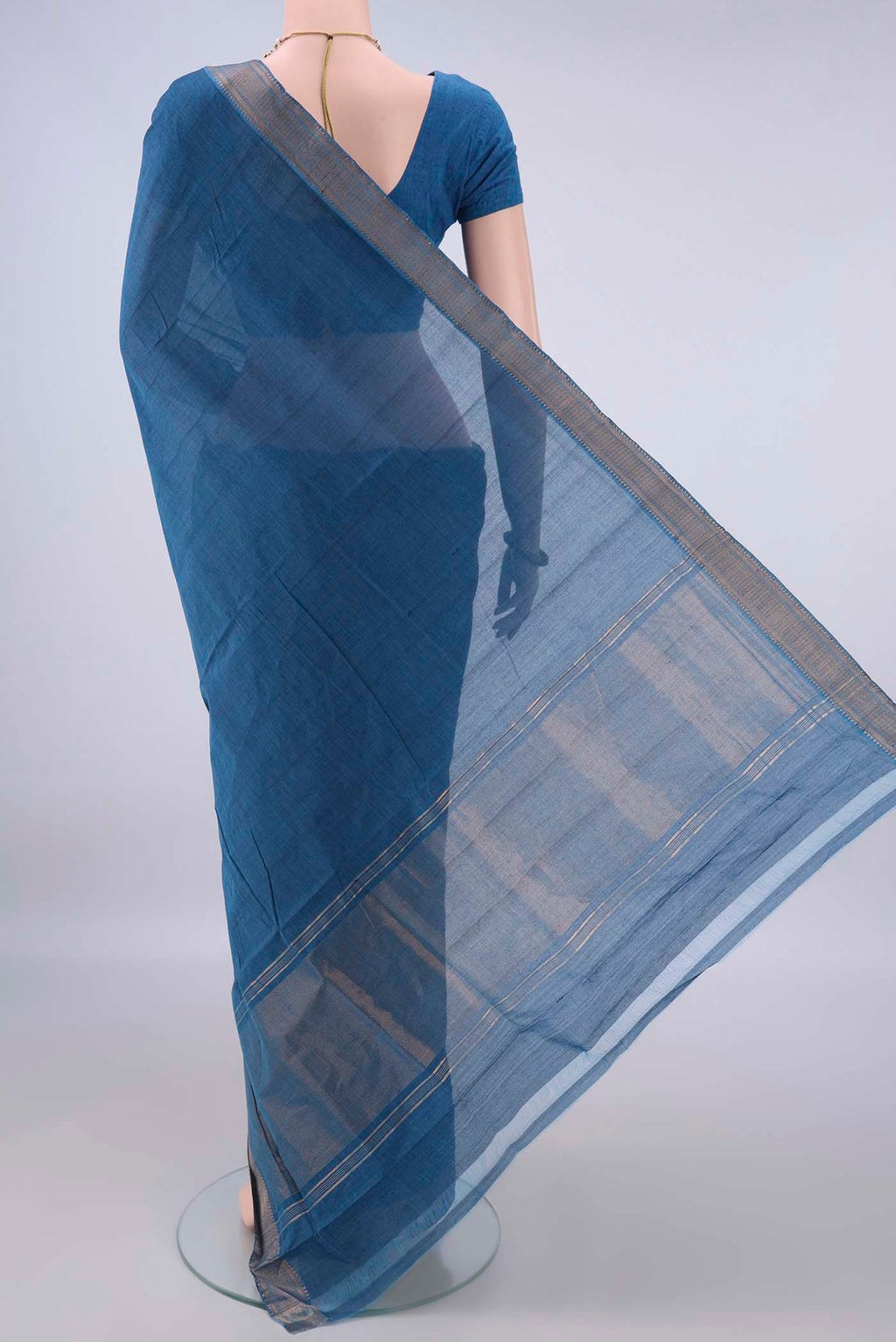 Flat view of Blue Mangalagiri Cotton Saree with Plain Body and Zari Border. 