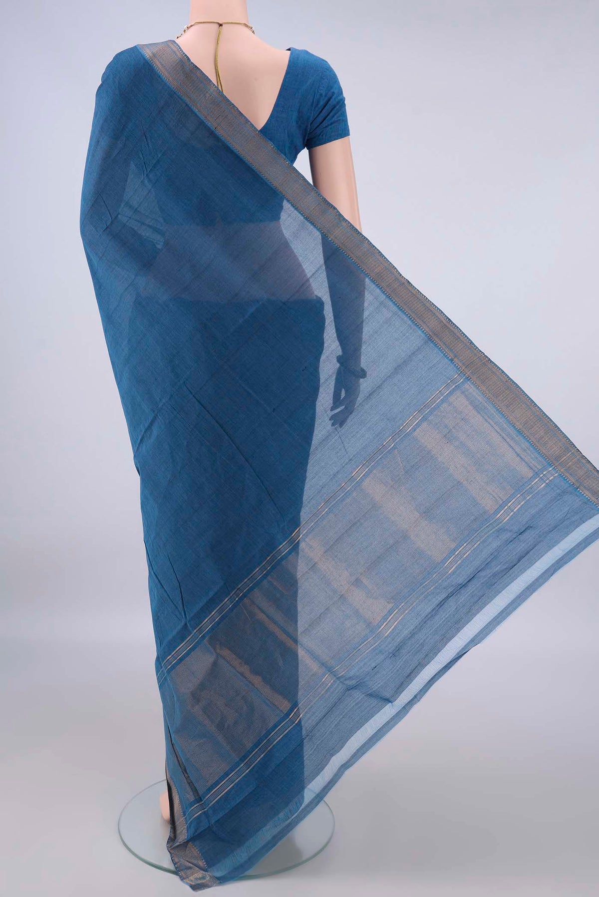 Flat view of Blue Mangalagiri Cotton Saree with Plain Body and Zari Border. 