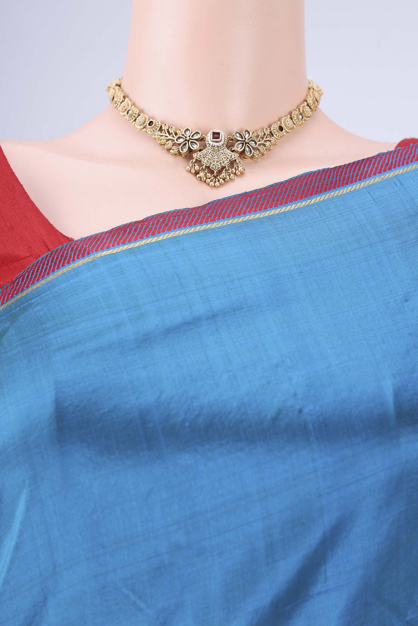 Border image of Blue Kanchipuram Silk Saree with Plain Body and Zari And Thread Border. 