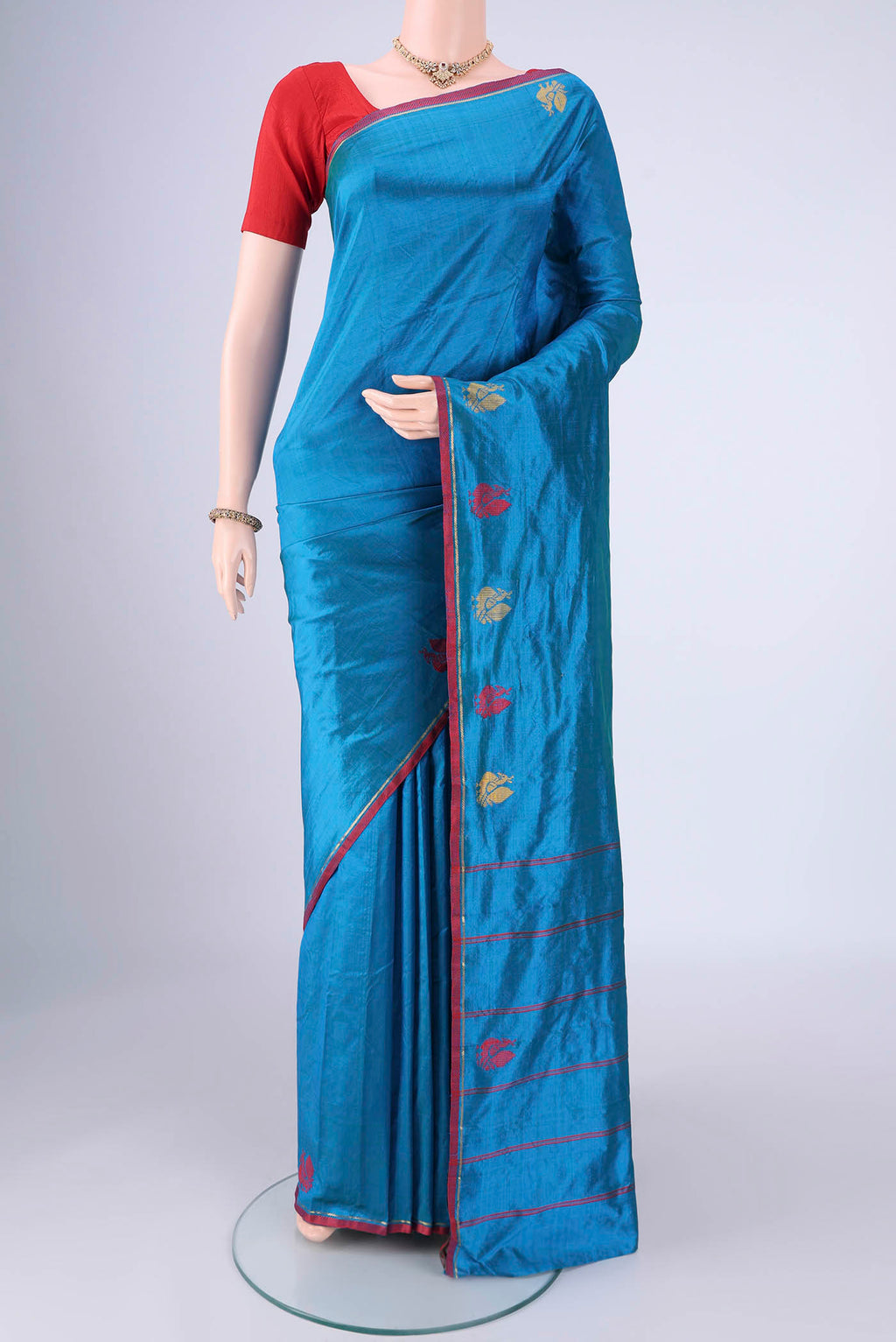 Blue Kanchipuram Silk Saree with Plain Body and Zari And Thread Border.  displayed on a mannequin