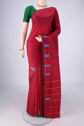 Maroon Kanchipuram Silk Saree with Plain Body and Thread Border.  displayed on a mannequin