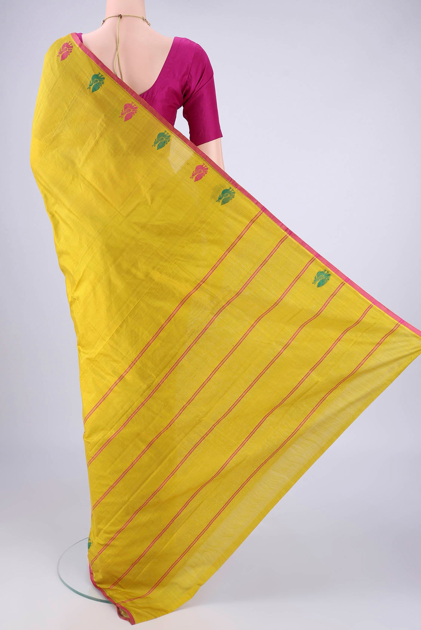 Flat view of Acid Green Kanchipuram Silk Saree with Plain Body and Zari And Thread Border. 