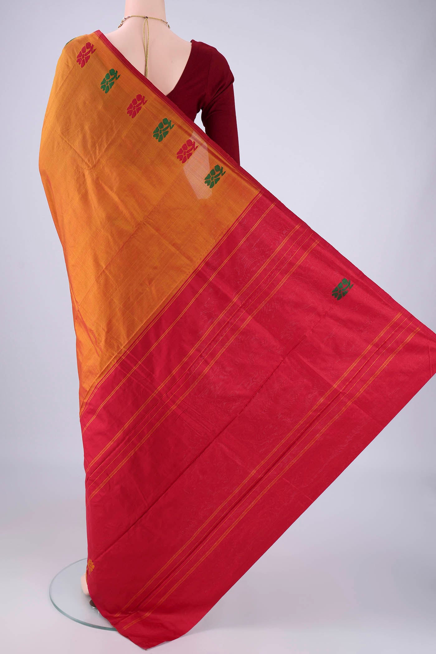 Flat view of Rust Kanchipuram Silk Saree with Plain Body and Thread Border. 