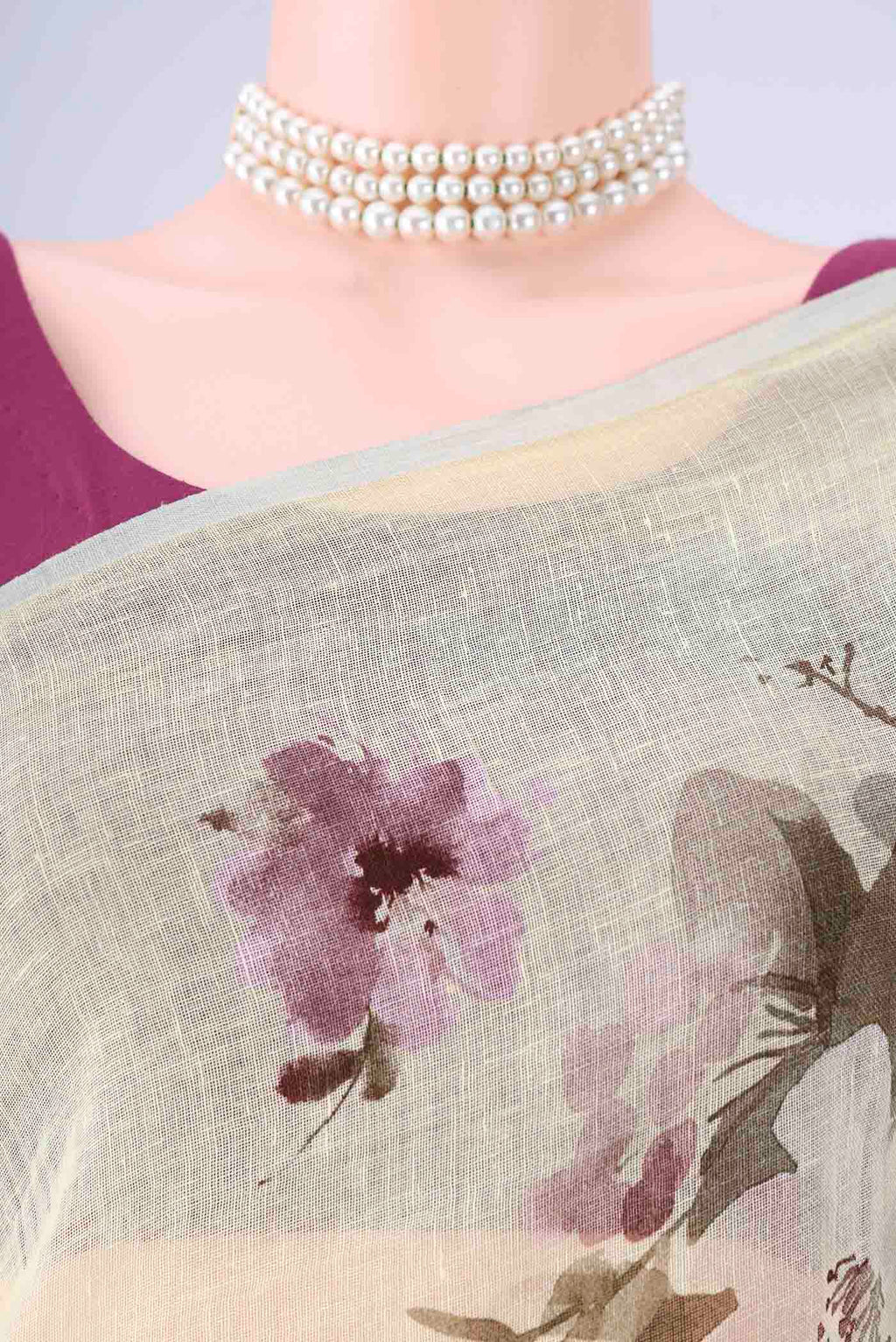 Border image of Sky Blue Linen Saree with Floral Print on the body and Zari Border. 