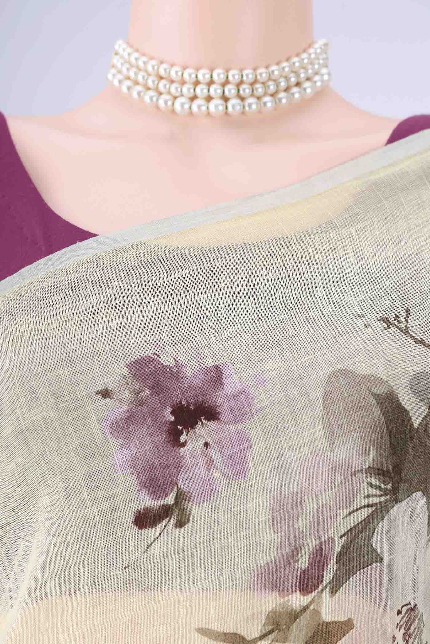 Border image of Sky Blue Linen Saree with Floral Print on the body and Zari Border. 