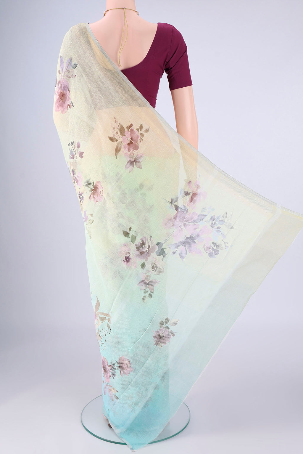 Flat view of Sky Blue Linen Saree with Floral Print on the body and Zari Border. 