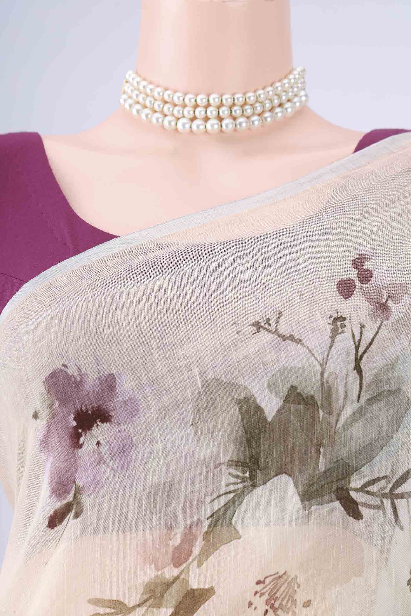 Border image of Mint Green Linen Saree with Floral Print on the body and Zari Border. 