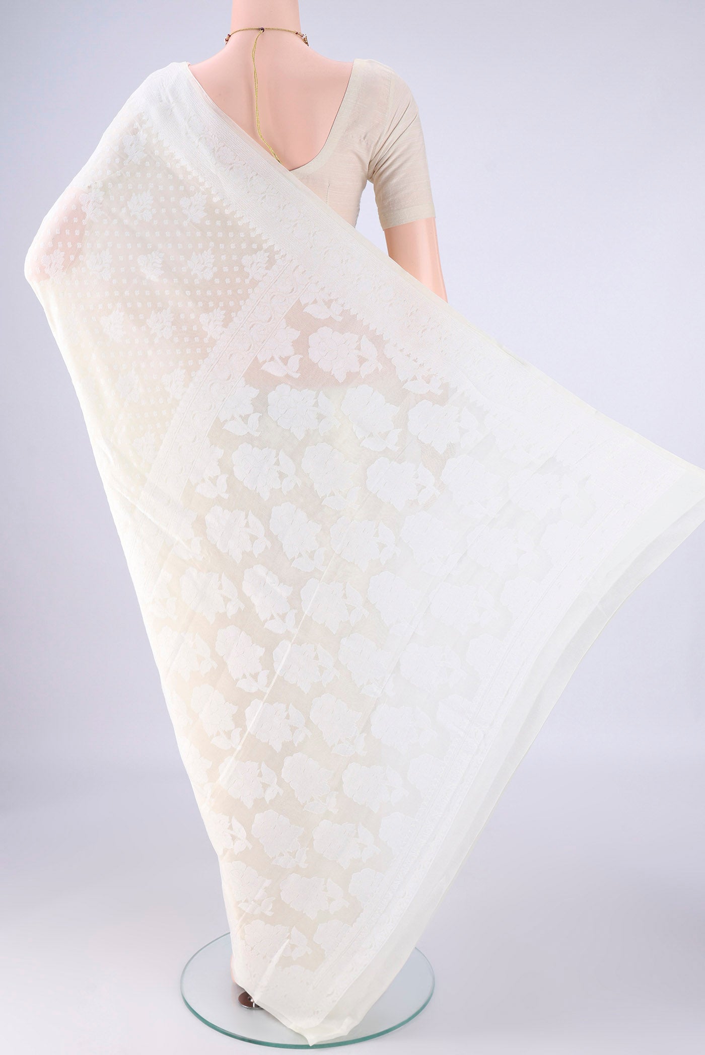 Flat view of Off White Blended Banarasi Georgette Saree with Thread Butta on the body and Thread Border. 
