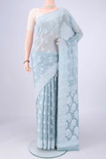 Blue Grey Blended Banarasi Georgette Saree with Thread Butta on the body and Thread Border.  displayed on a mannequin