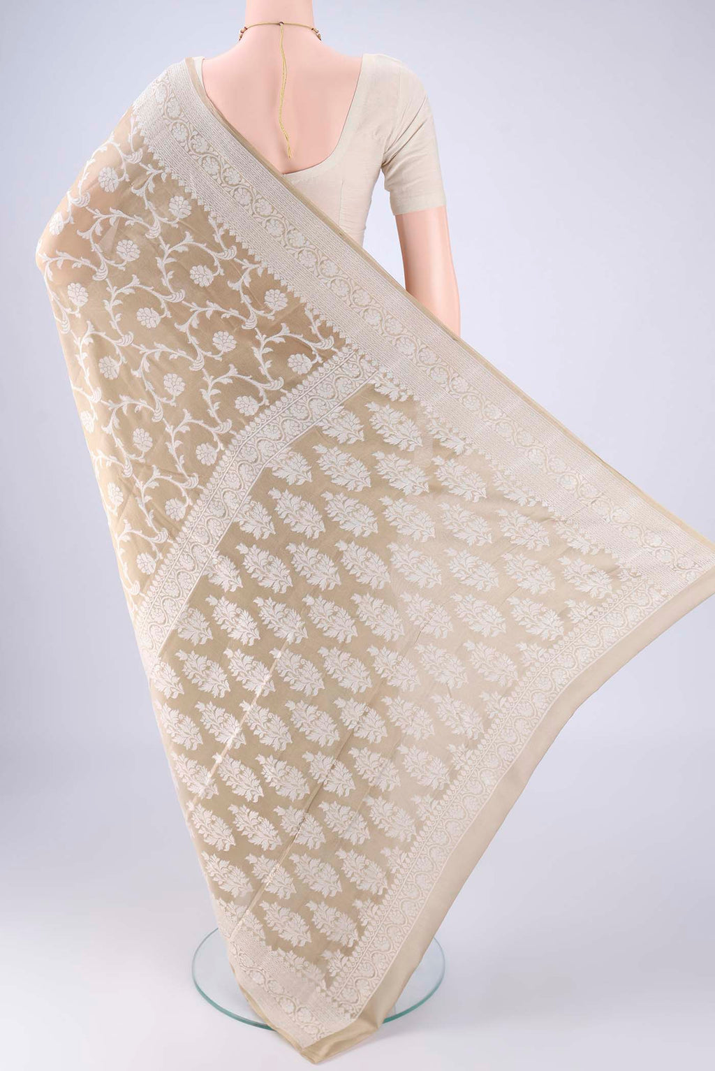 Flat view of Dark Beige Blended Banarasi Georgette Saree with Thread Butta on the body and Thread Border. 