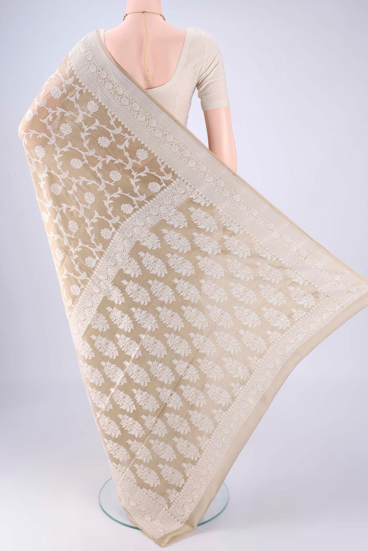 Flat view of Dark Beige Blended Banarasi Georgette Saree with Thread Butta on the body and Thread Border. 