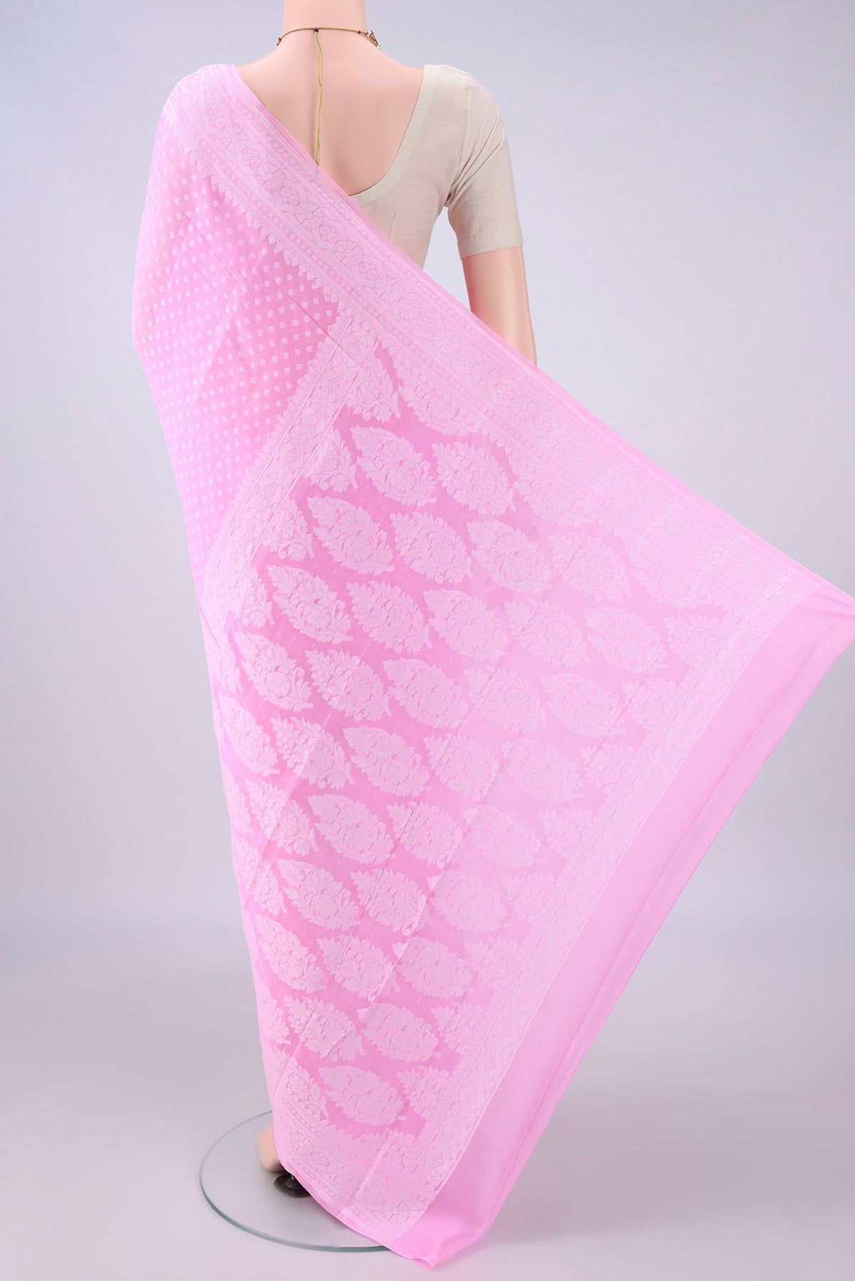 Flat view of Rose pink Blended Banarasi Georgette Saree with Thread Brocade on the body and Thread Border. 