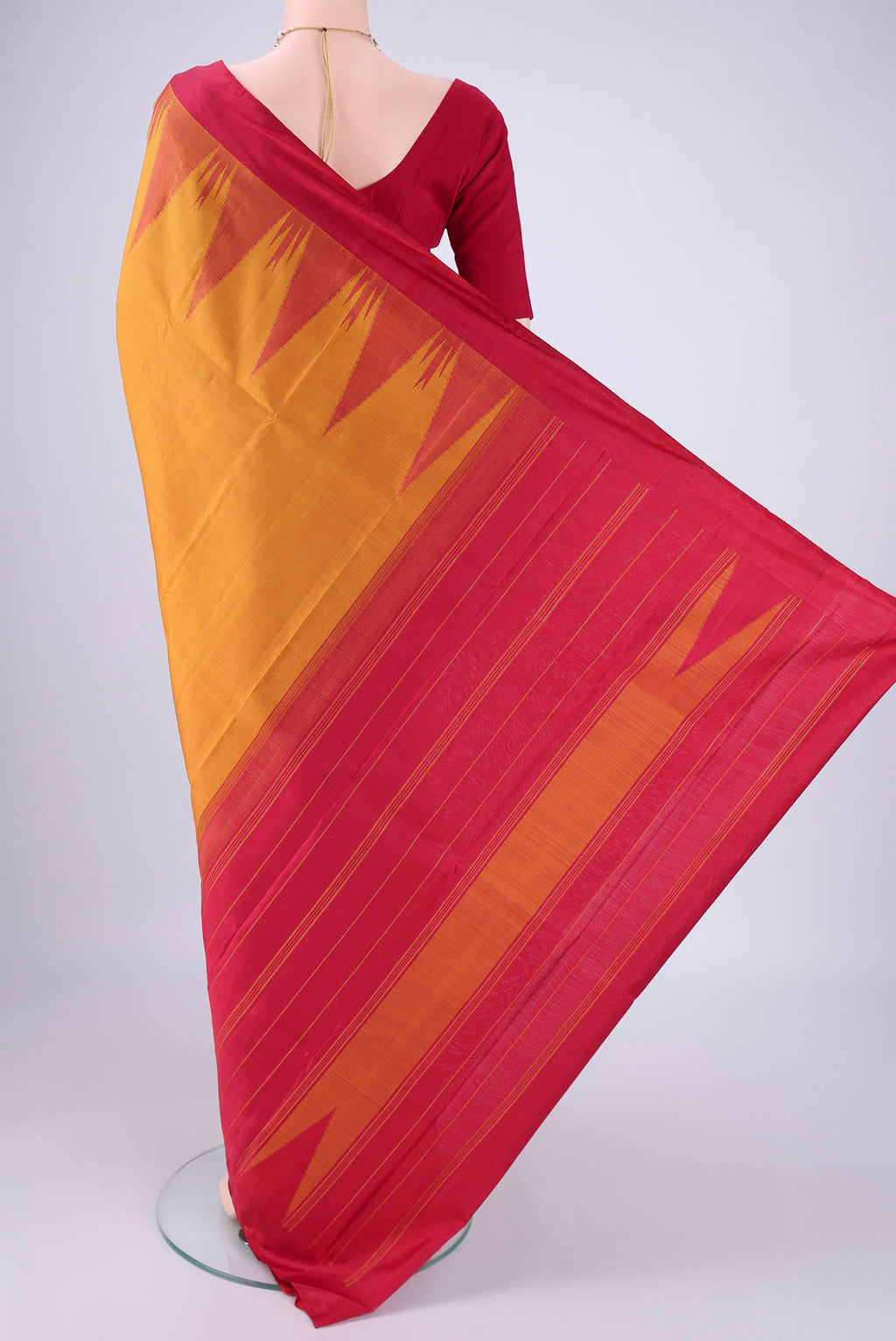 Flat view of Mustard Kanchipuram Silk Saree with Plain Body and Temple Border. 