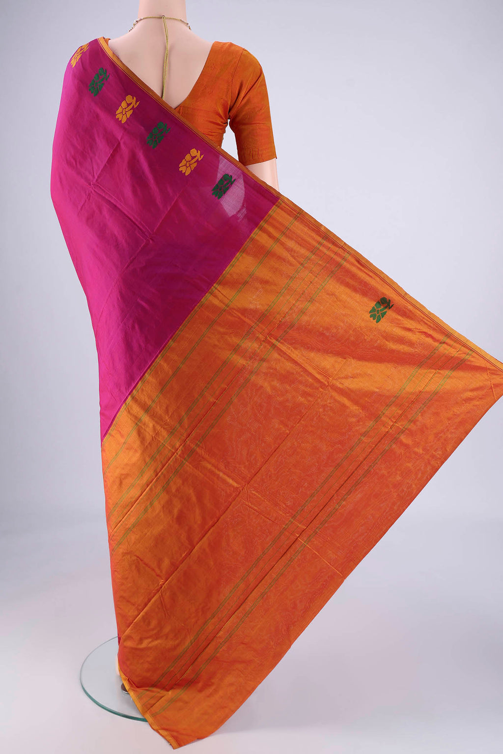 Flat view of Magenta Kanchipuram Silk Saree with Plain Body and Thread Border. 