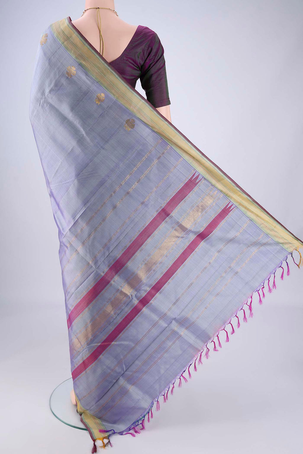Flat view of Blue Grey Kanjivaram Silk Saree with Plain Body and Zari Border. 
