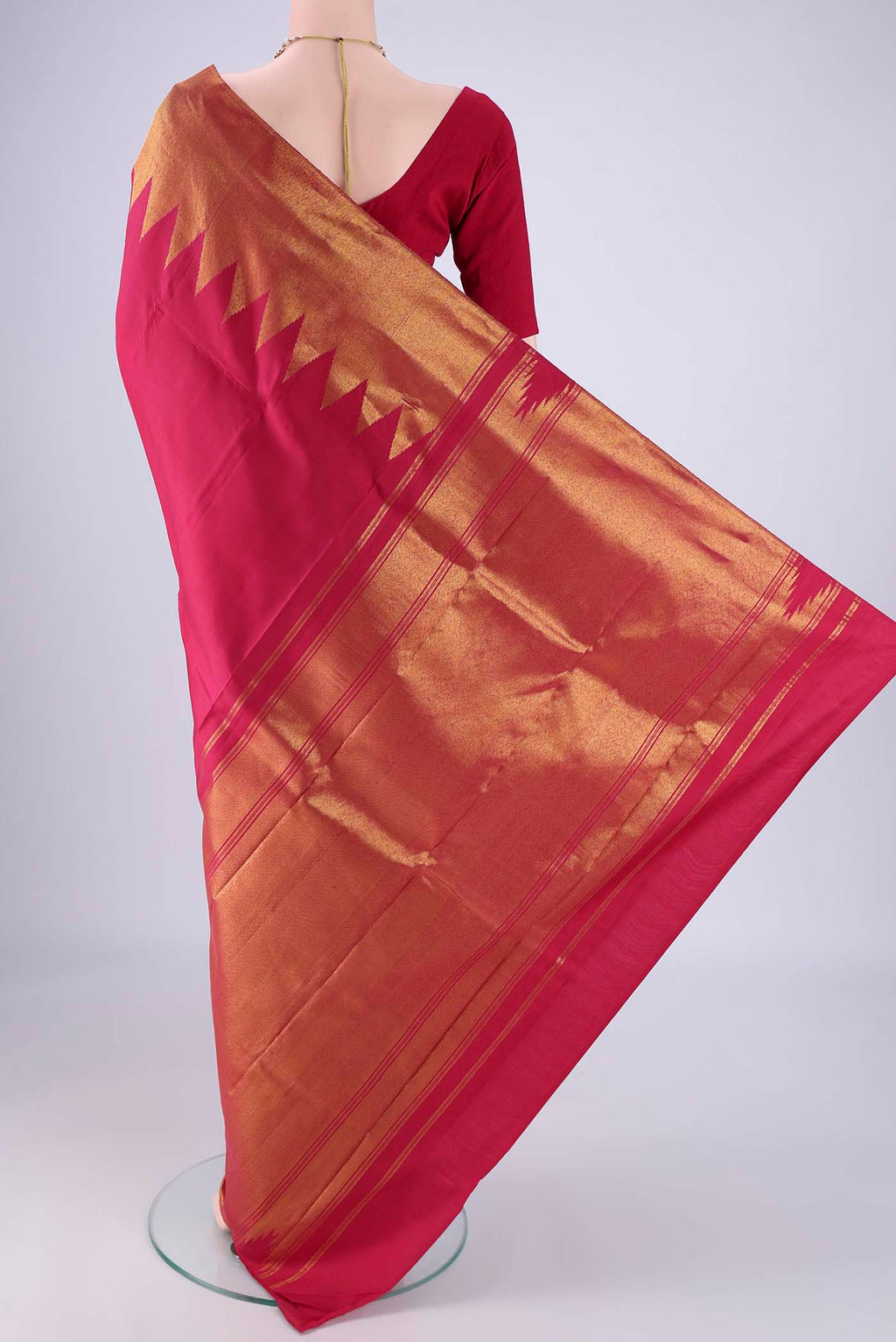 Flat view of Maroon Kanjivaram Silk Saree with Plain Body and Temple Border. 