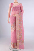 Peach Kota Cotton Saree with Embroidery on the body and Zari And Thread Border.  displayed on a mannequin