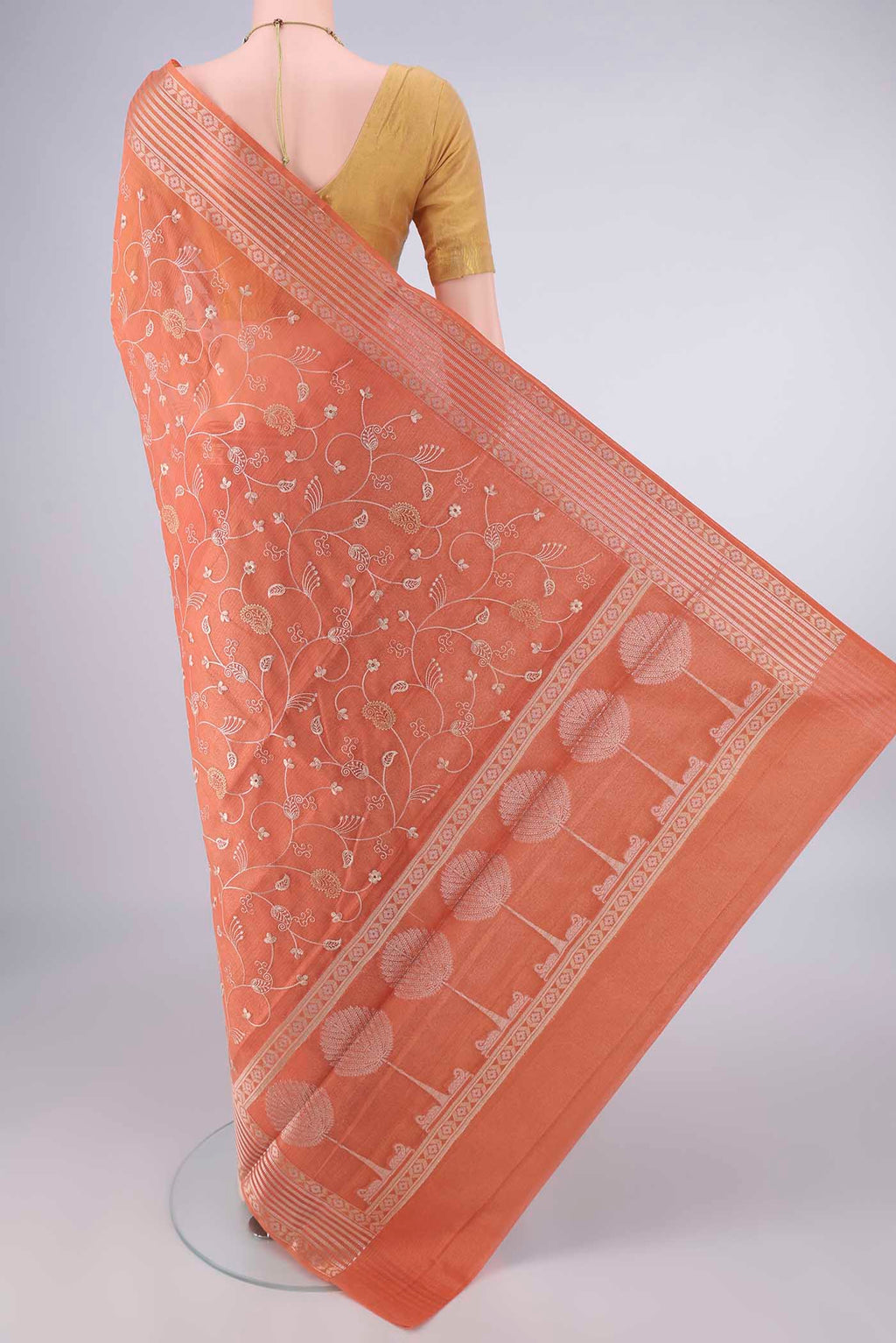Flat view of Brick Orange Blended Kota Cotton Saree with Embroidery on the body and Zari Border. 