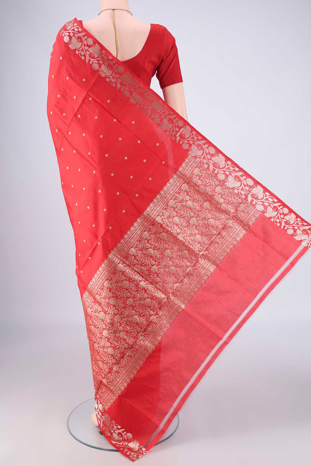 Flat view of Red Dual Tone Banarasi Katan Silk Saree with Zari Butta on the body and Zari Border. 